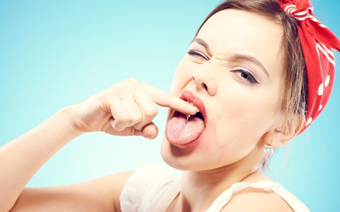 Piercing alla lingua e rischi per il cavo orale